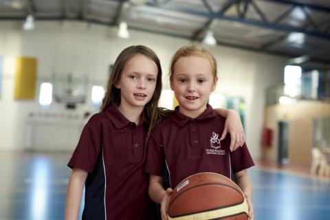 Melbourne Primary School students playing basketball