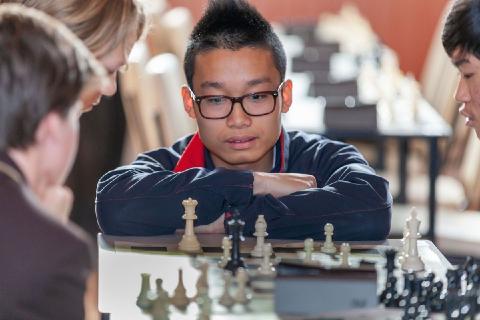 03. Online Photo - Student playing chess.jpg